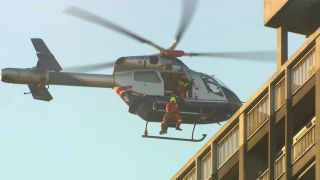 Sauveteur hélitreuilliste du GRIMP intervient à Liège à la suite d’un incendie dans la tour Kennedy